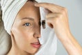 Beautiful women applying facial mask with moisturizer Royalty Free Stock Photo