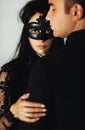 Woman with theatrical mask and handsome man