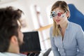 Woman doing eye test with optometrist in medical center Royalty Free Stock Photo