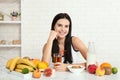 Beautiful women exists with pure skin on her face sitting at a table and eat breakfast. Asian woman eating healthy food at Royalty Free Stock Photo