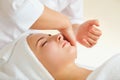 Beautiful woman at a facial massage at a spa salon Royalty Free Stock Photo