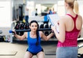Beautiful women in gym Royalty Free Stock Photo
