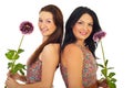 Beautiful women holding flowers Royalty Free Stock Photo