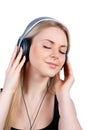 Beautiful women listening music in headphones Royalty Free Stock Photo