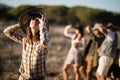 Beautiful woman looking through binoculars during safari vacation Royalty Free Stock Photo