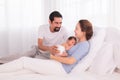 Beautiful women married man with beard Hispanic mix race, husband hold and looking wife and baby infant with love, mother embrace Royalty Free Stock Photo