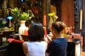Asian women lighting candles in Buddhist and Taoist Temple Jade Emperor Pagoda, Ho Chi Minh City, Vietnam. Royalty Free Stock Photo