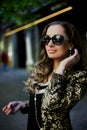 Beautiful women in sunglasses in city