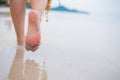 Beautiful women walk alone on the beach on Summer Royalty Free Stock Photo