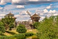 Beautiful wooden ancient Slavic settlement with windmill.