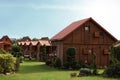 Beautiful wooden beach houses and green trees outdoors