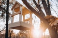 beautiful wooden birdhouse on the tree. autumn Royalty Free Stock Photo