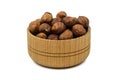 Beautiful wooden bowl with hazelnuts isolated on white background Royalty Free Stock Photo