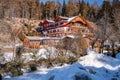 Beautiful wooden chalet hotel during winter season on sunny day