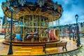 Beautiful wooden colorful French Carousel in Honfleur, Normandy, France, Europe Royalty Free Stock Photo