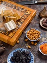 Beautiful wooden cutting board with cut pieces of pastila from baked apples Royalty Free Stock Photo