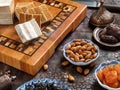 Beautiful wooden cutting board with cut pieces of pastila from baked apples Royalty Free Stock Photo