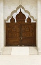 Beautiful wooden gate to a holy temple in India