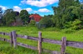 Beautiful wooden horse fence at an agricultural field Royalty Free Stock Photo