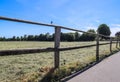 Beautiful wooden horse fence at an agricultural field Royalty Free Stock Photo