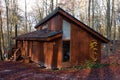 Beautiful Wooden house in black wood forest Royalty Free Stock Photo