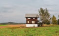 Beautiful wooden house on the field Royalty Free Stock Photo