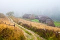 Beautiful wooden house on a green hill Royalty Free Stock Photo