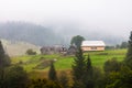 Beautiful wooden house on a green hill Royalty Free Stock Photo