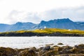 A beautiful wooden house in a green island of Atlantic Ocean in Iceland