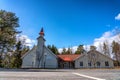 Beautiful wooden light yellow colored building of Church of Jesus Christ of Latter-day Saints in Umea, Northern Sweden. Front side