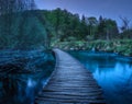 Beautiful wooden path in green forest in Plitvice Lakes, Croatia Royalty Free Stock Photo