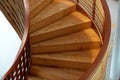 Beautiful Wooden spiral staircase inside the building Royalty Free Stock Photo