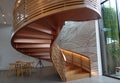 Beautiful Wooden spiral staircase inside the building Royalty Free Stock Photo