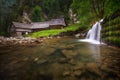 Beautiful wooden water mill at National Nature Reserve Kvacianska dolina valley. Slovak republic.