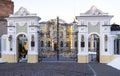 Beautiful wrought iron gates, cobbles, stucco.