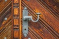 Beautiful wrought iron handle of an old door in Switzerland Royalty Free Stock Photo
