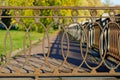 Beautiful wrought iron lattice in the park in autumn