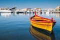 A beautiful yellow boat in Marzamemi harbour, Sicily