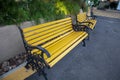 Beautiful yellow chairs in a park. Cool Sitting area