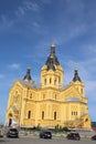 Beautiful yellow church building and bright blue sky Royalty Free Stock Photo