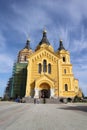 Beautiful yellow church building and bright blue sky Royalty Free Stock Photo