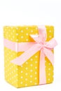 Beautiful yellow gift box close up. Royalty Free Stock Photo