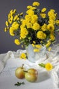 Beautiful yellow mums and pears Royalty Free Stock Photo