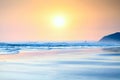 Beautiful yellow orange sunset on ocean beach.