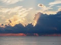 Beautiful yellow-pink sunset in the clouds over the sea Royalty Free Stock Photo