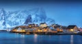 Beautiful yellow rorbuer and houses in Norway Royalty Free Stock Photo