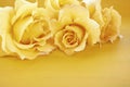 Beautiful yellow roses on rustic wood table. Royalty Free Stock Photo