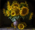beautiful yellow Sunflower still life bouquet in a clay jug ceramic rustic style oil honey Dark photo background wooden table Royalty Free Stock Photo