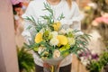 Beautiful yellow valentine bouquet in woman hands
