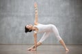 Beautiful Yoga: Utthita Trikonasana, extended triangle pose Royalty Free Stock Photo